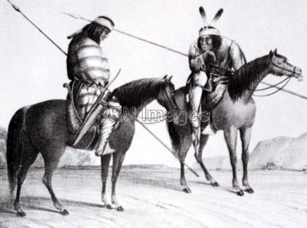 Two Navajo warriors on horseback