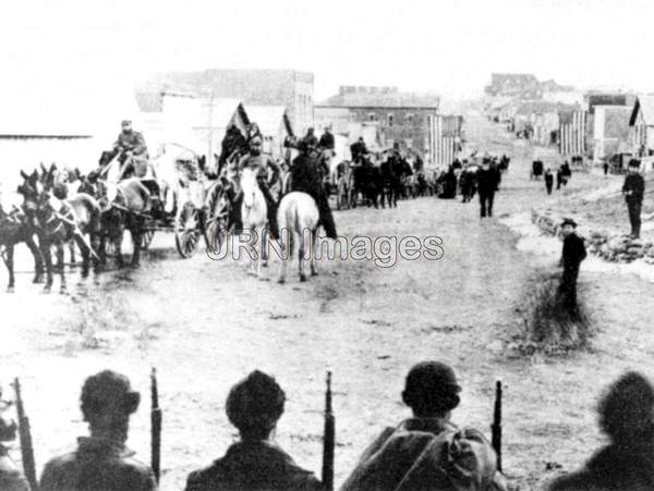 United States cavalrymen stand prepared