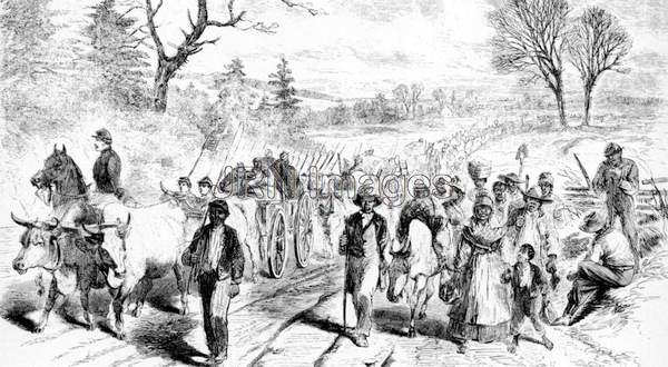 Former slaves, accompanied by Union troops