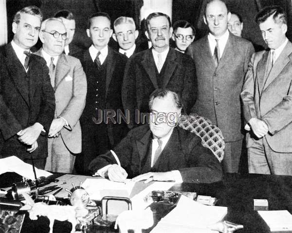 Franklin Delano Roosevelt signing the historic Agricultural Adjustment Act