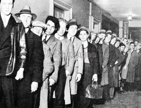 Teenage men line up to enroll in the Civilian Conservation Corps