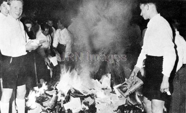 Young Nazis burning books