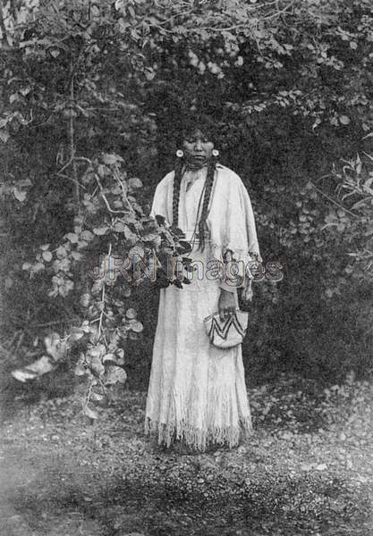 Nespelem girl wearing deerskin dress