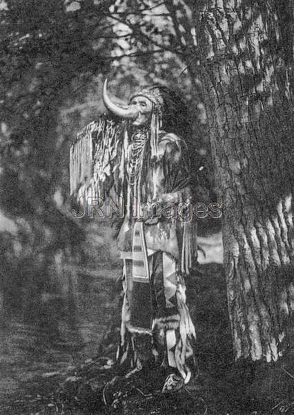 Flathead warrior drinking from horn