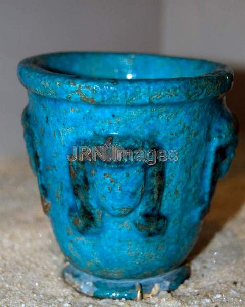 Cup decorated with heads of the goddess Hathor