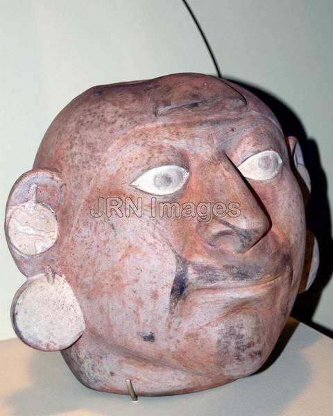 Ceramic vessel of man with goatee and ear ornaments