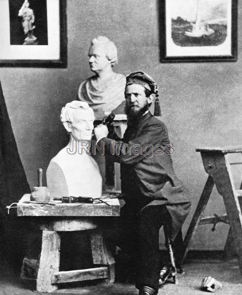 Leonard Wells Volk working on bust of Lincoln